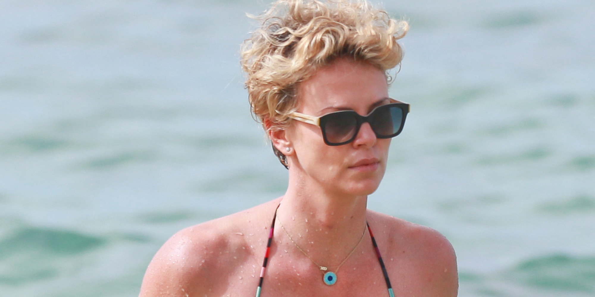 Charlize Theron Shows Off Her Amazing Bikini Body On Winter Sun Holiday