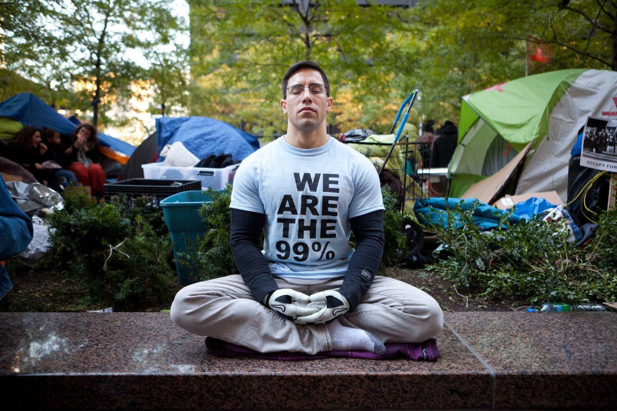 Angel Soto, 32, of Staten Island, meditates at the Occupy Wall Street protests in Zuccotti Park, Sunday, Nov. 6 in New York. 