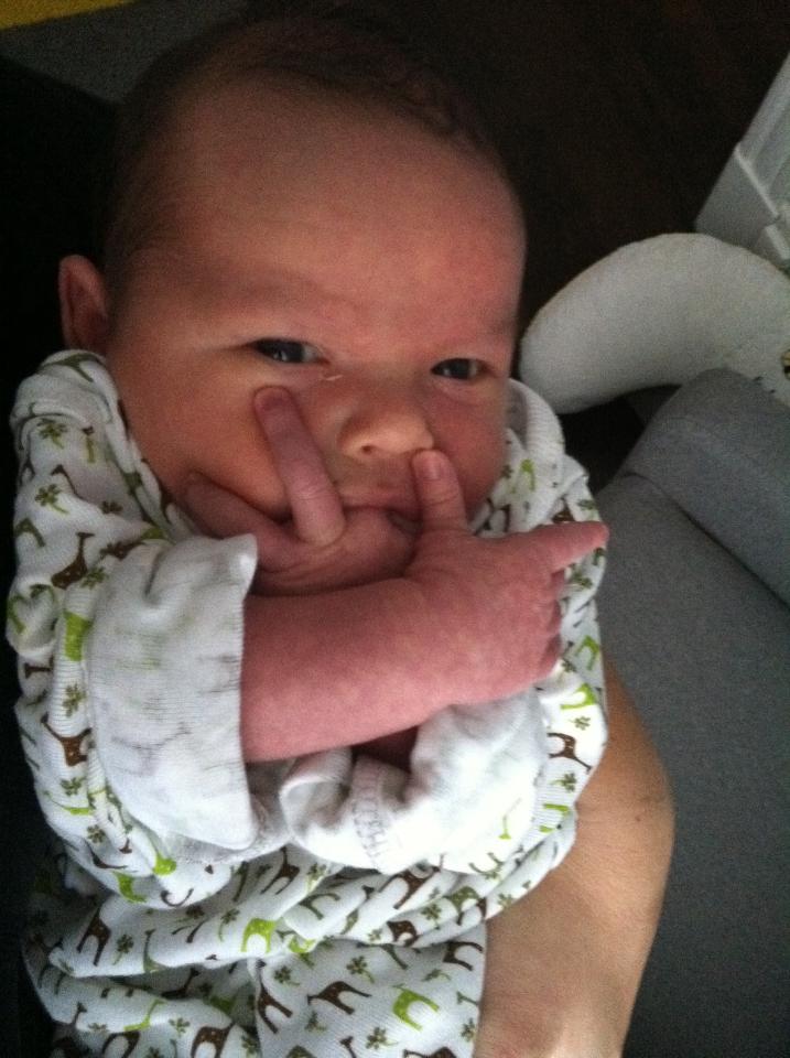 baby-flips-off-camera-shows-the-world-how-he-really-feels-photo