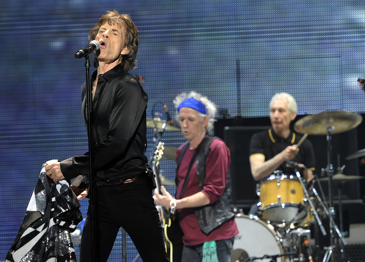 Mick Jagger, left, Keith Richards, center, and Charlie Watts of the Rolling Stones perform on the kick-off of the band's "50 