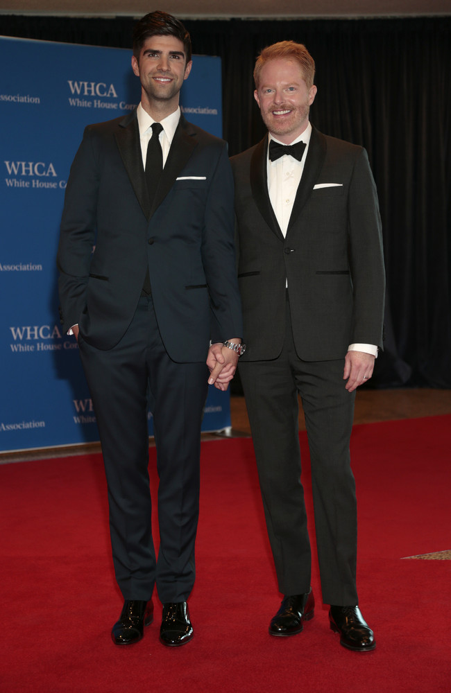 Actor Jesse Tyler Ferguson, right, and husband Justin Mikita arrive for the White House Correspondents' Association (WHCA) di