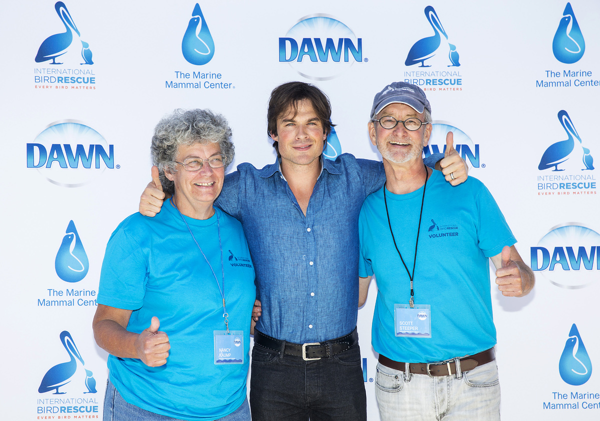 Actor Ian Somerhalder with volunteers from International Bird Rescue, Scott Steeper and Nancy Kaump, celebrating the launch o