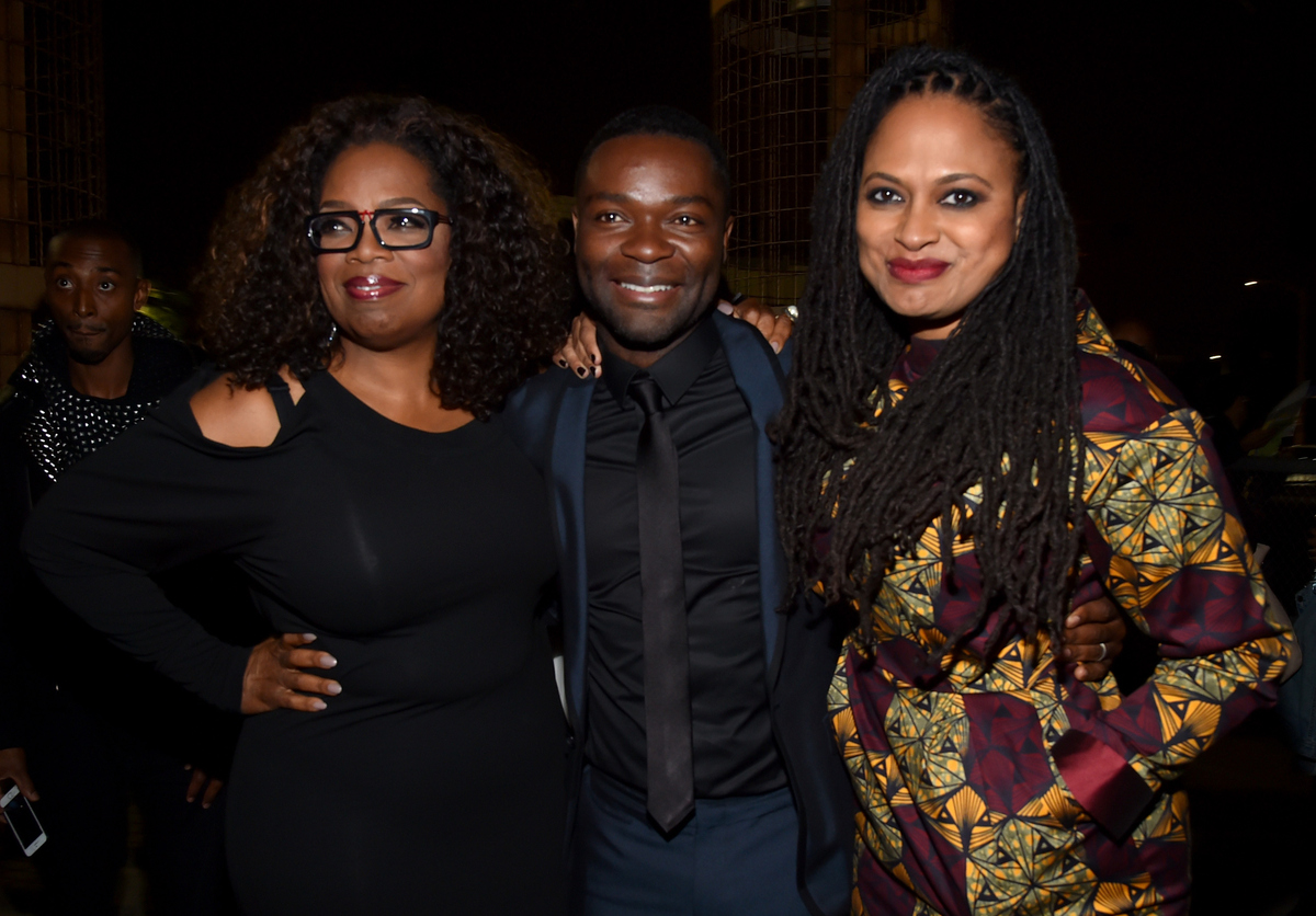 HOLLYWOOD, CA - NOVEMBER 11: (L-R) Producer/actor Oprah Winfrey, actor David Oyelowo, and director Ava DuVernay attend the '