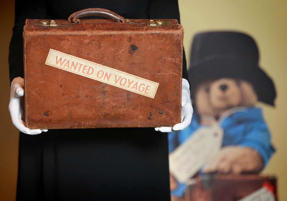 paddington bear with boots and suitcase