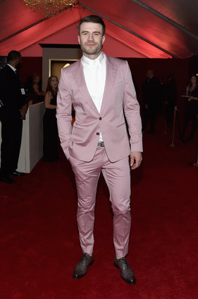 This suit is just a bit ill-fitting and the sheen on the fabric doesn't quite have the luxe look we think he was going for. But the pink in honour of Valentine's Day yesterday may win Sam Hunt a few points. 