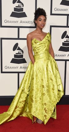 This sunny hue looks beautiful against Lianne's skin tone and the asymmetrical neckline and hem keep this gown from being anything-but-boring. 
