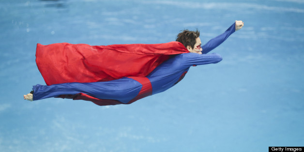 BEIJING, CHINA - MARCH 15: (CHINA OUT) A diver dressed as Superman performs during day one of the FINA Diving World Series Beijing Station at the National Aquatics Center on March 15, 2013 in Beijing, China. (Photo by ChinaFotoPress/Getty Images)