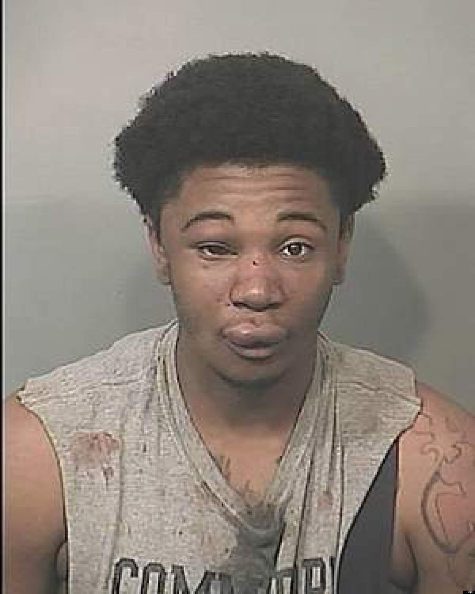 Michael Maxwell, Suspected Robber, Takes Mugshot After Victims Beat