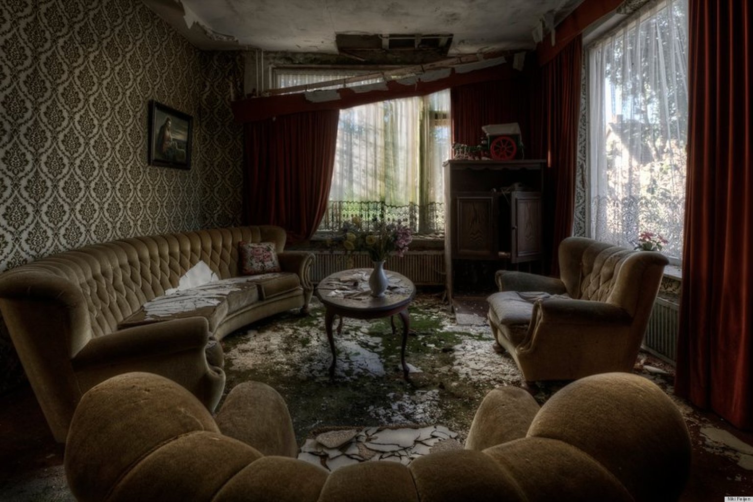 Abandoned Mansion Features Upholstered Furniture, Pictures