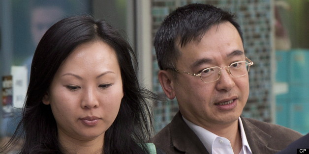 Franco Yui Kwan Orr and his partner Oi Ling Nicole Huen arrive at the B.C. Supreme court in downtown Vancouver, B.C. on May 30. The couple are accused of not paying a nanny for four years of work. (THE CANADIAN PRESS/Jonathan Hayward)