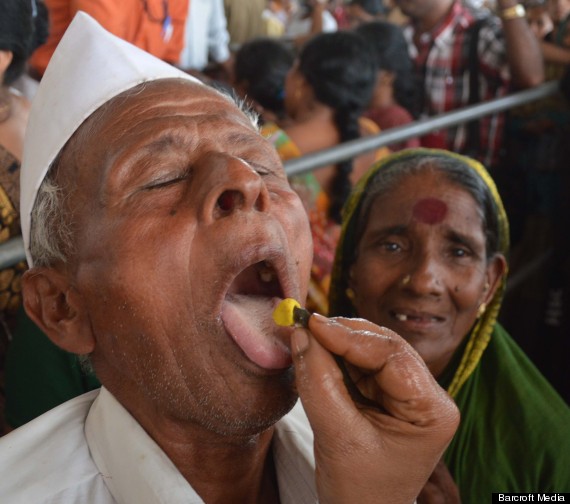 Indians Swallow Fish Filled With Medicine To Cure Asthma (PICTURES