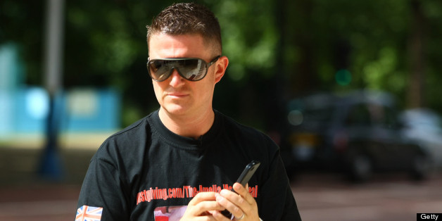 LONDON, ENGLAND - JUNE 29: Joint EDL leader Tommy Robinson walks along the Mall on June 29, 2013 in London, England. The leaders of the English Defence League, Tommy Robinson and co-leader Kevin Carroll planned to march from Hyde Park to Woolwich to raise money for a young girl fighting against neuroblastoma, but were arrested outside Aldgate East Tube Station. (Photo by Jordan Mansfield/Getty Images)