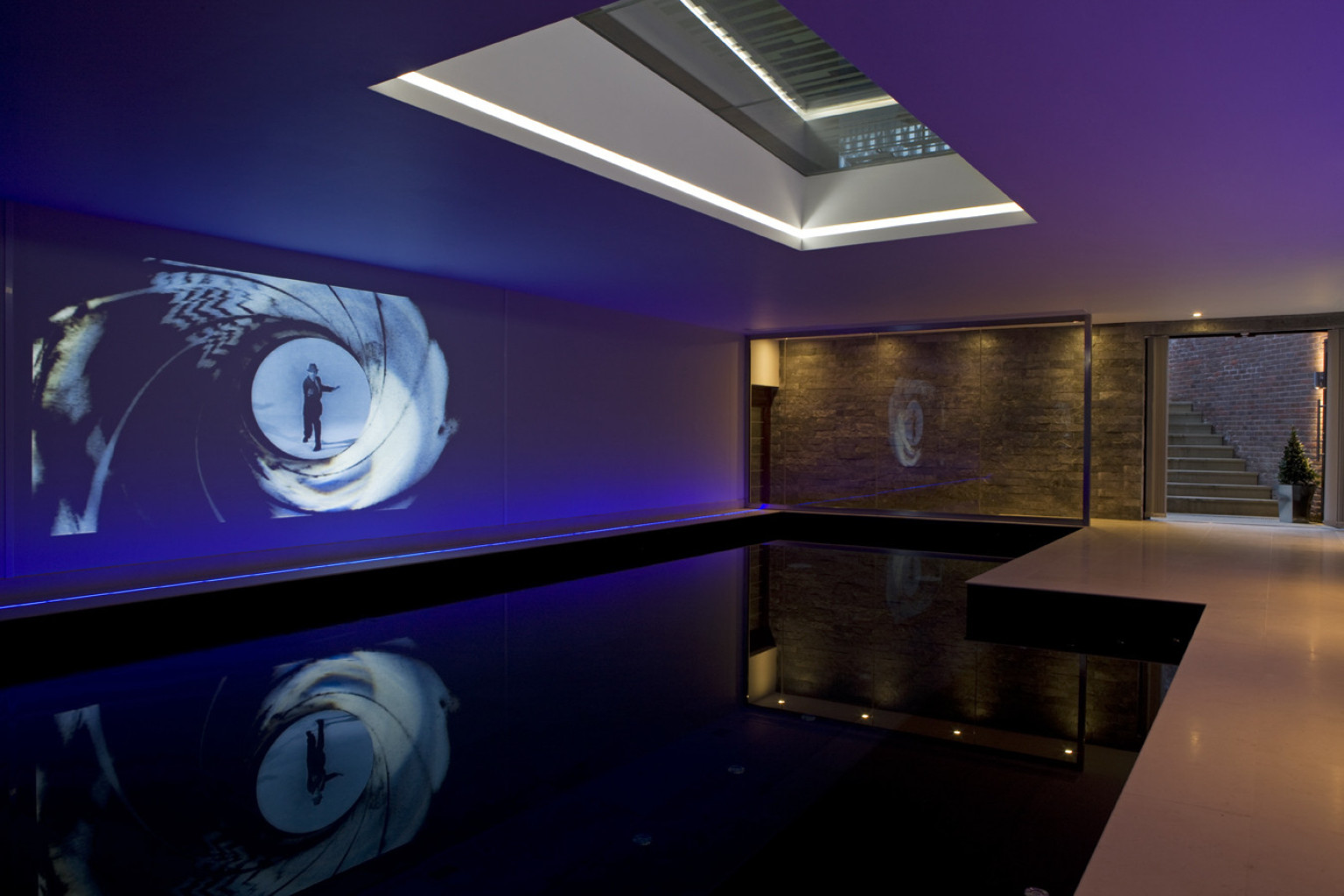 Kingston Mansion's Swimming Pool Movie Theater Is Possibly The Coolest