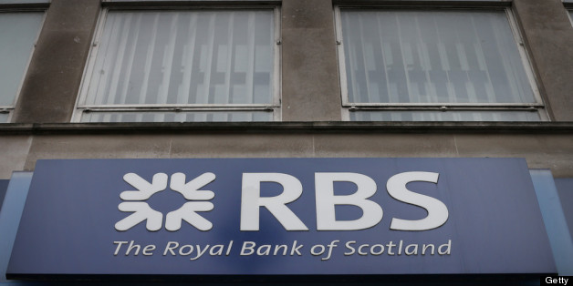 LONDON, ENGLAND - APRIL 03: A sign hangs over the entrance to a branch of The Royal Bank of Scotland on April 3, 2013 in London, England. Investors have launched a compensation claim against The Royal Bank of Scotland claiming that the bank misled shareholders about the state of it's books before it collapsed in 2008. (Photo by Peter Macdiarmid/Getty Images)