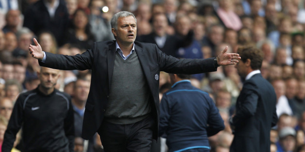 Chelsea's Portuguese manager Jose Mourinho gestures from the touchline during the English Premier League football match between Tottenham Hotspur and Chelsea at White Hart Lane in London on September 28, 2013. AFP PHOTO/ IAN KINGTON RESTRICTED TO EDITORIAL USE. NO USE WITH UNAUTHORIZED AUDIO, VIDEO, DATA, FIXTURE LISTS, CLUB/LEAGUE LOGOS OR LIVE SERVICES. ONLINE IN-MATCH USE LIMITED TO 45 IMAGES, NO VIDEO EMULATION. NO USE IN BETTING, GAMES OR SINGLE CLUB/LEAGUE/PLAYER PUBLICATIONS (P