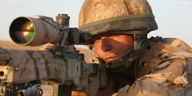 British army sniper peers through the scope of his rifle, to scan the horizon for suspected Taliban insurgents, north of Musa Qala in Helmand, Afghanistan.
Musa Qala town was one of the most bitterly contested parts of Helmand, which itself was one of the most dangerous places in Afghanistan. Hundreds of British and American soldiers and marines, and countless Afghan civilians, were killed in gun battles, ambushes, air strikes and by improvised explosive devices after the US led invasion toppled the Taliban regime in 2001.