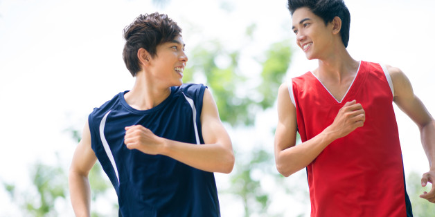two healthy boys jogging in the ...