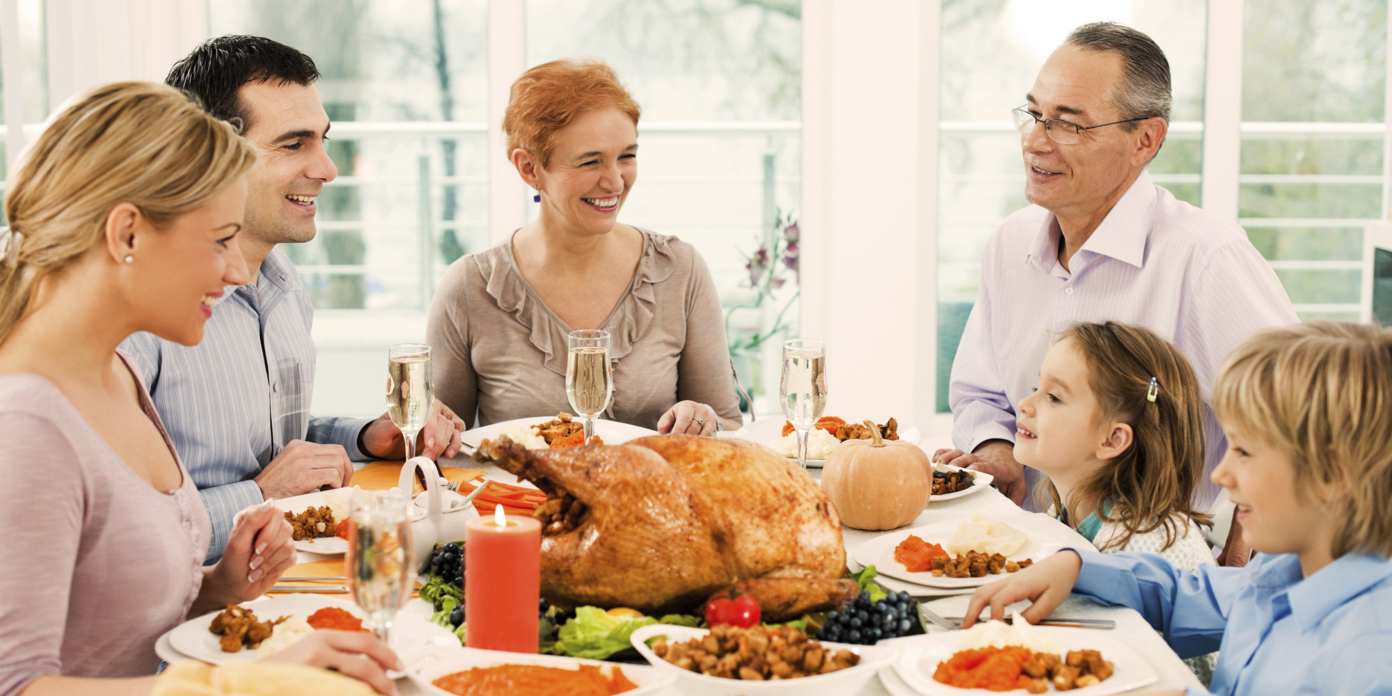 Resultado de imagem para family members gathered around the Thanksgiving table