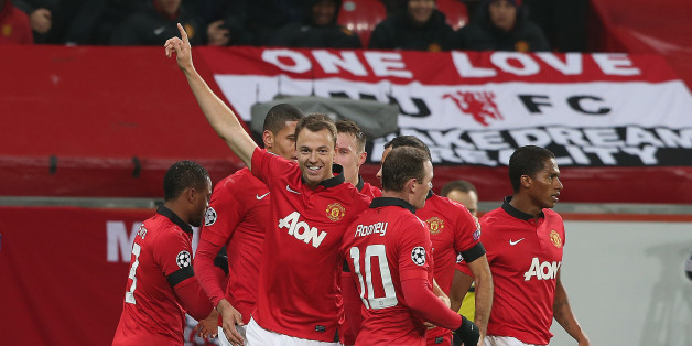 LEVERKUSEN, GERMANY - NOVEMBER 27: Jonny Evans of Manchester United celebrates scoring their third goal during the UEFA Champions League Group A match between Bayer Leverkusen and Manchester United at BayArena on November 27, 2013 in Leverkusen, North Rhine-Westphalia. (Photo by Matthew Peters/Man Utd via Getty Images)