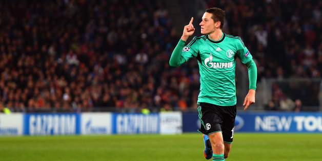 Schalke's midfielder Julian Draxler celebrates after scoring during the UEFA Champions League group E football match FC Schalke 04 vs FC Basel 1893 in Gelsenkirchen, Germany, on December 11, 2013. AFP PHOTO / PATRIK STOLLARZ (Photo credit should read PATRIK STOLLARZ/AFP/Getty Images)