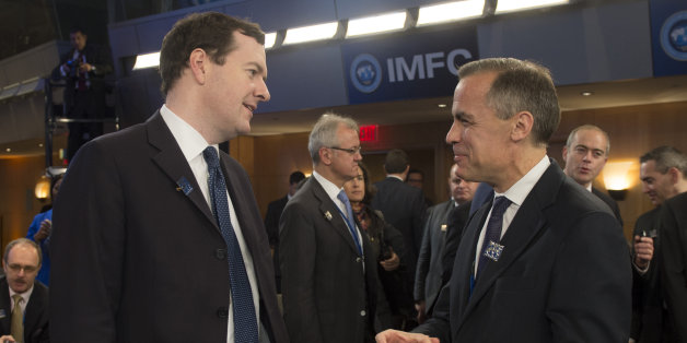 Governor of the Bank of England Mark Carney (R) talks with British Finance Minister George Osborne (L) during annual IMF/World Bank meetings in Washington, DC, October 12, 2013. AFP PHOTO / Jim WATSON (Photo credit should read JIM WATSON/AFP/Getty Images)
