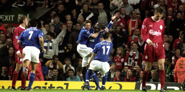 Kevin Campbell celebrates his winner in front of the Kop in 1999