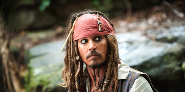 FILE - In this file film publicity image released by Disney, Johnny Depp portrays Captain Jack Sparrow in a scene from, "Pirates of the Caribbean: On Stranger Tides." Captain Jack and his "Pirates of the Caribbean" continue to dominate the overseas box office, but not without a fight from the "X-Men" and "Hangover" gangs. (AP Photo/Disney, Peter Mountain, File)