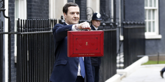 George Osborne, U.K. chancellor of the exchequer, holds the dispatch box containing the 2014 budget as members of the H.M. Treasury leave 11 Downing Street in London, U.K., on Wednesday, March 19, 2014. Osborne will lay out a budget today focused on securing Britain's economic recovery and rebutting opposition Labour Party claims that he's ignoring the rising cost of living. Photographer: Simon Dawson/Bloomberg via Getty Images