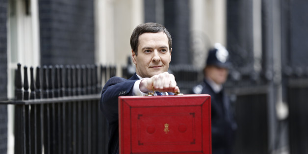 George Osborne, U.K. chancellor of the exchequer, holds the dispatch box containing the 2014 budget as he stands outside 11 Downing Street in London, U.K., on Wednesday, March 19, 2014. Osborne will lay out a budget today focused on securing Britain's economic recovery and rebutting opposition Labour Party claims that he's ignoring the rising cost of living. Photographer: Simon Dawson/Bloomberg via Getty Images
