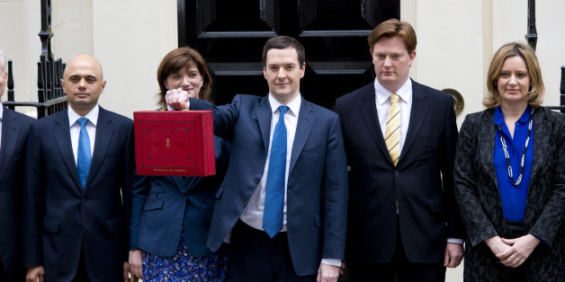 George Osborne leaves Downing Street before delivering his 2014 budget announcement at the House of Commons.
