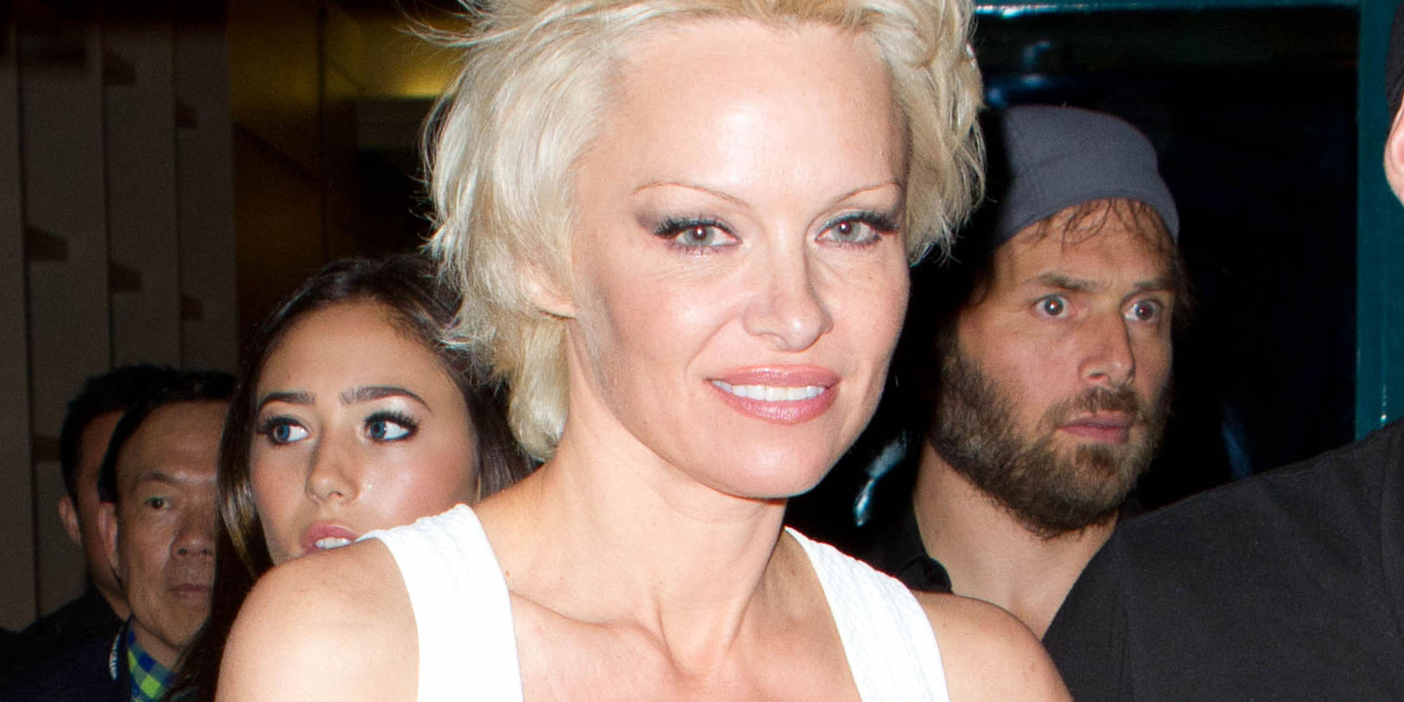 Pamela Anderson Finally Starts To Remove Barbed Wire Tattoo | HuffPost