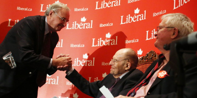 Former prime minister Paul Martin (left) shakes hands with former Liberal cabinet minister Herb Gray (centre) as former prime minister John Turner (right) looks on during a tribute in Ottawa, Monday November 19, 2012 to Gray's 50 years of public service. (THE CANADIAN PRESS/Fred Chartrand)