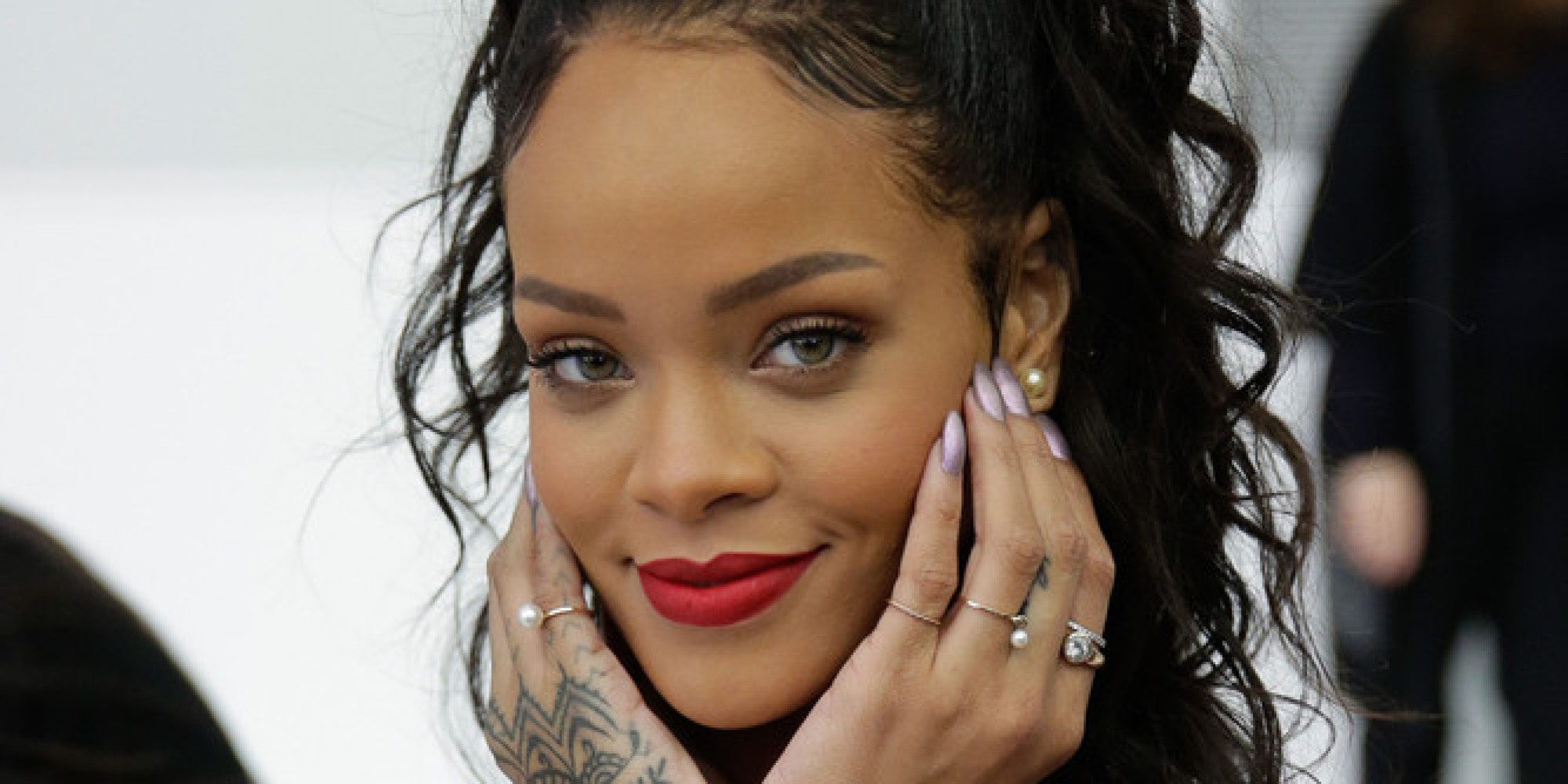 Rihanna Gets 'Pretty In Pink' For Christian Dior Cruise 2015 Show