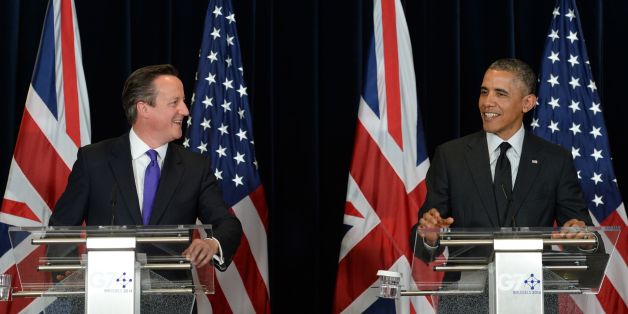British Prime Minister David Cameron (left) holds a press conference with US President Barack Obama during the G7 Summit held at the EU headquarters in Brussels, Belgium.