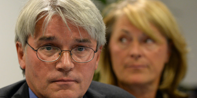 Andrew Mitchell and his wife Dr Sharon Bennett during a press conference in London, as he gives his reaction to the Crown Prosecution Service decision on the Plebgate row.
