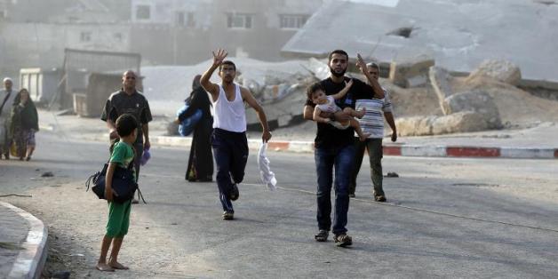 Des palestiniens fuyant le quartier de Chajaya