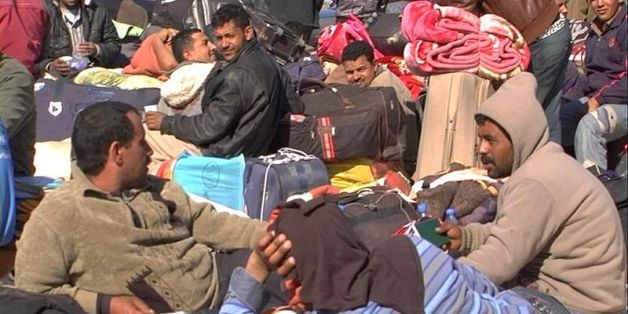Des milliers de personnes fuyant la Libye restent bloquées au poste frontière de Ras Jedir en 2011 (photo d'archive)