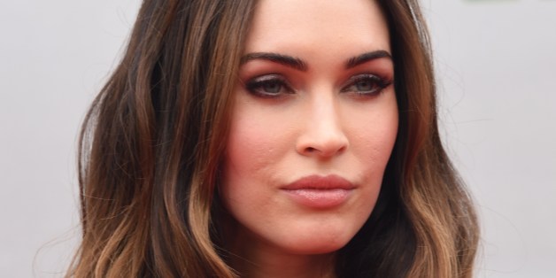 Cast member Megan Fox arrives for the premiere of 'Teenage Mutant Ninja Turtles' on August 3, 2014 at the Regency Village Theater in Los Angeles. AFP PHOTO / Robyn Beck (Photo credit should read ROBYN BECK/AFP/Getty Images)
