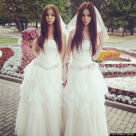 Androgyne Russian Groom Dmitry Kozhukhov And Bride Alisa Tie The Knot In Identical White Wedding