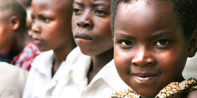 These students were waiting patiently for their friends to finish giving a performance. Afterwards, we played a game of soccer with them. This girl was smiling the entire time we visited the school. Although this has an Attribution-ShareAlike license on it, I do not have a model release. I highly recommend the tour company we used on this trip: <a href="http://www.thomsonsafaris.com">www.thomsonsafaris.com</a> and the organization who planned it for us: <a href="http://www.familyadventures.com">www.familyadventures.com</a>. This was published in the Thomson Safaris catalog for 2008-2009: <a href="http://www.thomsonsafaris.com/moreinfo.asp">www.thomsonsafaris.com/moreinfo.asp</a>