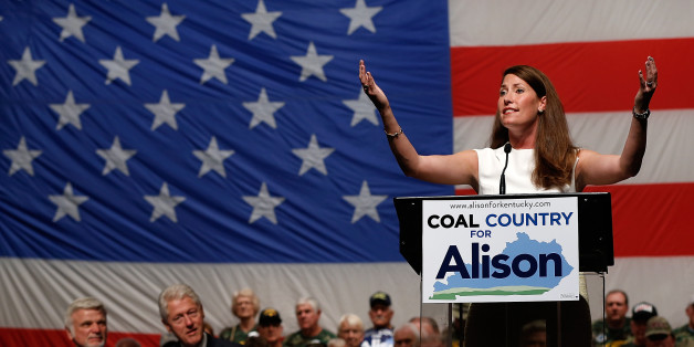 US Senate Democratic candidate and Kentucky Secretary of State Alison Lundergan Grimes speaks at a campaign event with former US President Bill Clinton on August 6, 2014