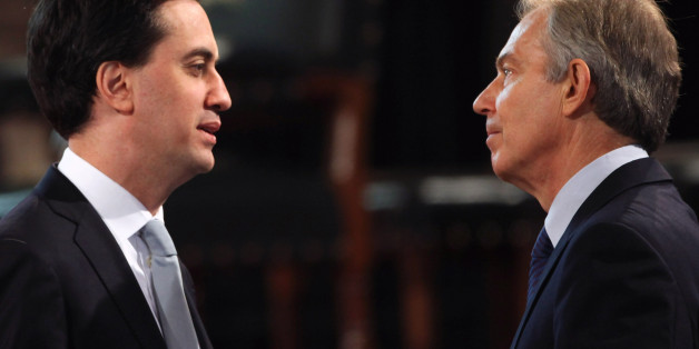 Leader of the Labour party Ed Miliband and former British Prime Minister Tony Blair speak before Queen Elizabeth II addressed both Houses of Parliament as part of her visit to mark her Diamond Jubilee year.