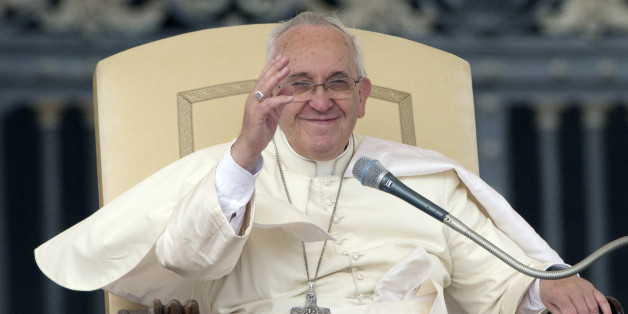 Pope Francis waves to the faithful during his weekly general audience, in St.Peter's Square, at the Vatican, Wednesday, Oct. 22, 2014. (AP Photo/Andrew Medichini)