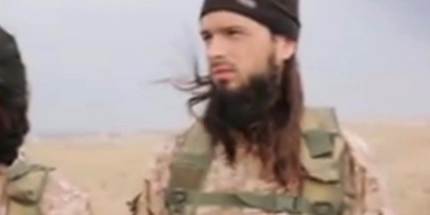 This still image taken from an undated video published on the Internet by the Islamic State group militants and made available, Sunday, Nov. 16, 2014 shows a militant that the French government say is Frenchman Maxime Hauchard . Interior Minister Bernard Cazeneuve said there is a "strong presumption" that Maxime Hauchard is among the group of Islamic extremist fighters in the video released over the weekend. He urged young people in France to "open your eyes to the terrible reality" of the milit