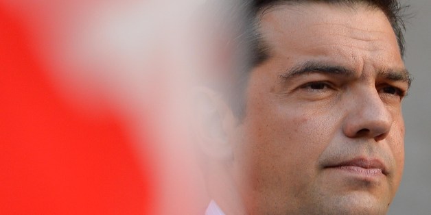 Alexis Tsipras, leader of Greece's left-wing political party Syriza, attends a meeting at Piazza Farnese in central Rome on July 19, 2014. AFP PHOTO / ANDREAS SOLARO (Photo credit should read ANDREAS SOLARO/AFP/Getty Images)