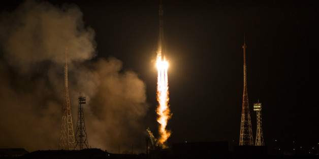 The Soyuz-FG rocket booster with Soyuz TMA-15M space ship carrying a new crew to the International Space Station, ISS, blasts off at the Russian leased Baikonur cosmodrome, Kazakhstan, Monday, Nov. 24, 2014. The Russian rocket carries U.S. astronaut Terry Virts, Russian cosmonaut Anton Shkaplerov and Italian astronaut Samantha Cristoforetti. (AP Photo/NASA, Aubrey Gemignani)