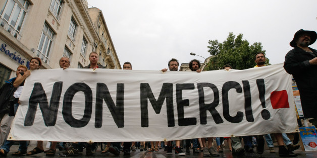 Part-time and temporary arts workers, striking artists and theater personnel, known as "intermittents", demonstrate, in Avignon, Friday, July 4, 2014. Organizers of one of Europeâs premier theater festivals are canceling some shows amid a protest movement by cultural workers over changes to their off-season unemployment benefits. The director of the Festival dâAvignon, Olivier Py, told journalists in Avignon that two plays scheduled for Fridayâs opening night have been called off.