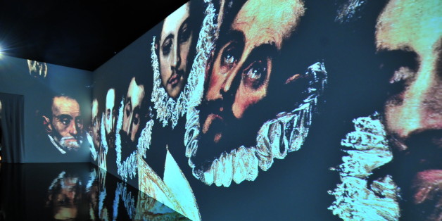 Visitors walk as they visit the exhibition of paintings of Greek-born Spanish Renaissance master El Greco in Beaux Arts Museum in Brussels on Febuary 3, 2010. The exhibition, �EL GRECO Domenikos Theotokopoulos 1900� returns to Europe after a two-month stay at the Palacio de Bellas Artes in Mexico. The next stop for the exhibition is BOZAR, the Palais des Beaux-Arts in Brussels, where it will run from 4 February to 9 May.AFP PHOTO GEORGES GOBET (Photo credit should read GEORGES GOBET/AFP/Getty Images)