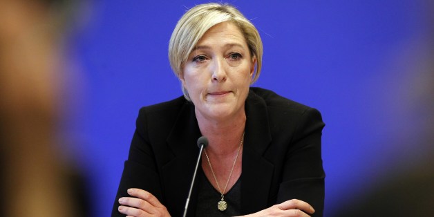 Marine Le Pen, vice-president of far-right party's Front National (FN) and daughter of FN's leader Jean-Marie Le Pen, gives a press conference in Nanterre, near Paris on December 13, 2010 at her party headquarters. Marine Le Pen is under fire after comparing Muslims praying in the streets outside overcrowded mosques in France to the Nazi occupation, during a rally of the anti-immigrant National Front on December 10. AFP PHOTO JOEL SAGET (Photo credit should read JOEL SAGET/AFP/Getty Image