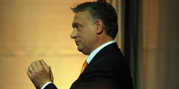 Hungarian Prime Minister Viktor Orban delivers his victory speech at the election party of the governing FIDESZ party in Budapest on May 25, 2015, during the night of European Parliamental elections. AFP PHOTO / FERENC ISZA (Photo credit should read FERENC ISZA/AFP/Getty Images)